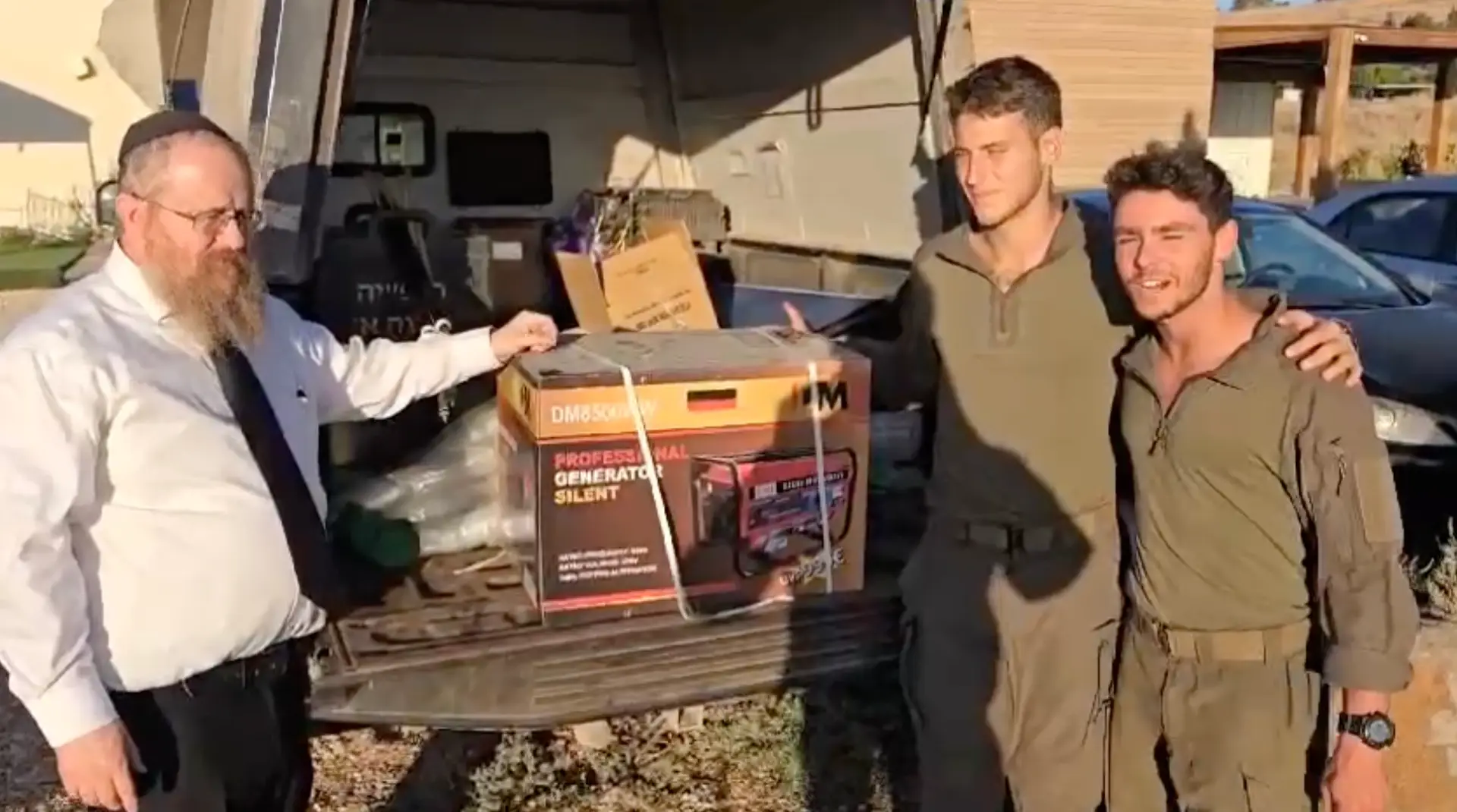 Rabbi Hertzel delivering generators to soldiers on the northern front lines